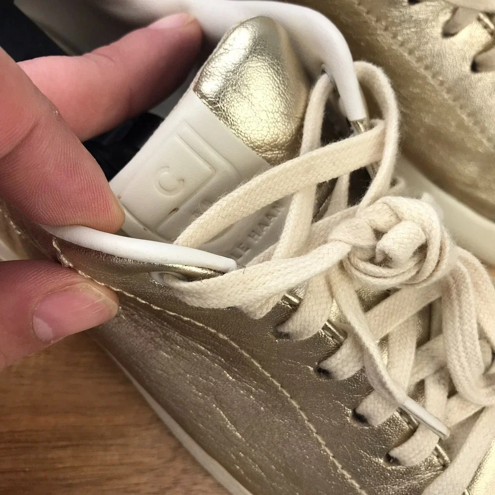 Cole Haan Grand Pro Tennis Shoe Womens 9B Metallic Gold Leather Lace Up Sneakers